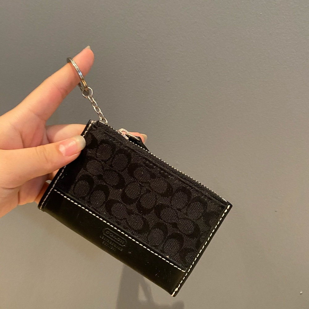 Coach black mini pouch
